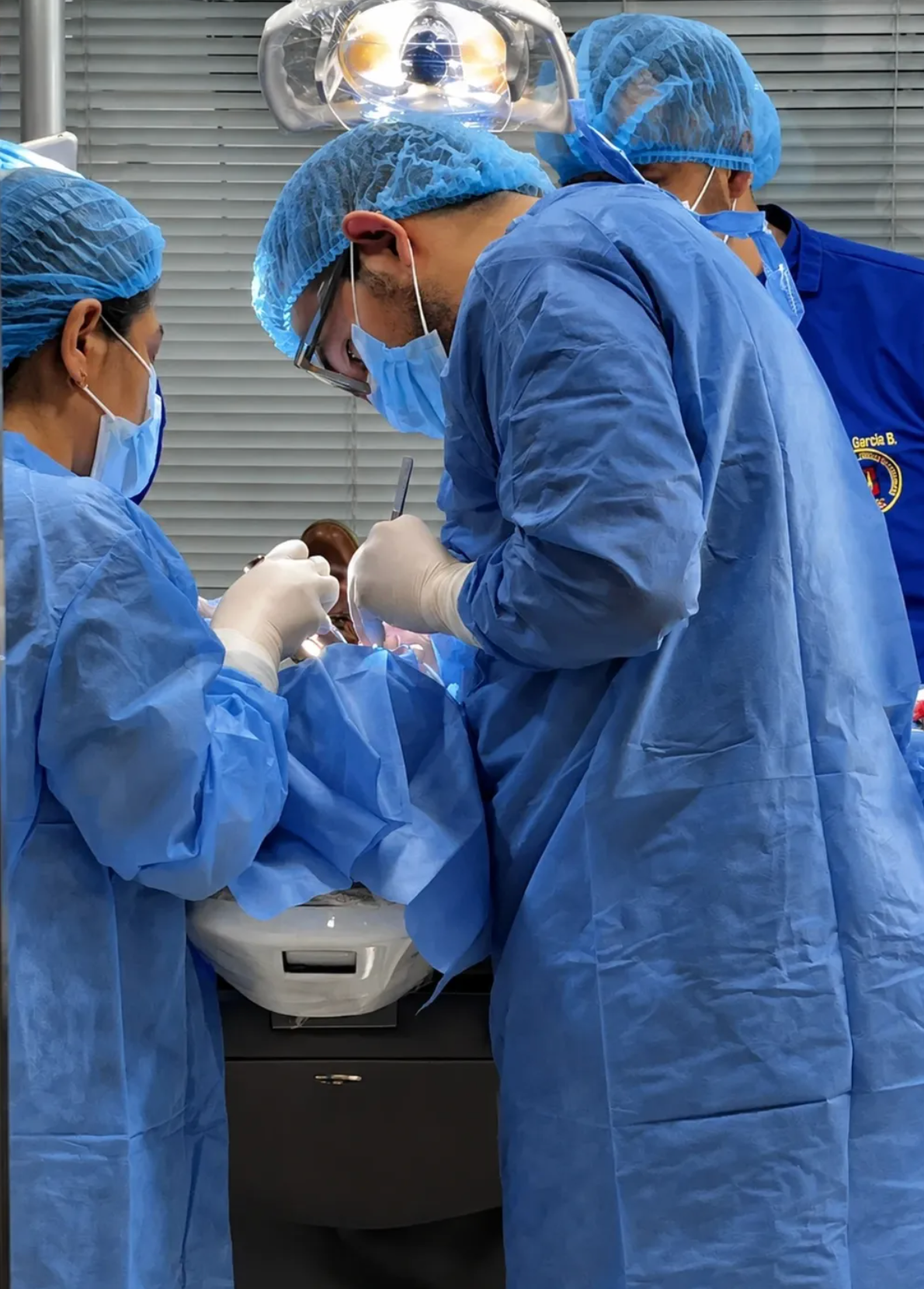 Dr. Alex performing surgery